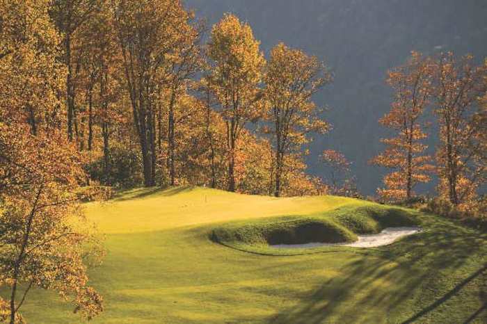 The second hole green amid the fall foliage. 